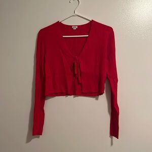 Tie-up long-sleeve crop top.